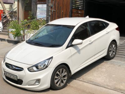 Hyundai White Verna Fluidic 1.6 CRDi SX Automatic, 2014, Diesel | 1st Owner & Brown interior